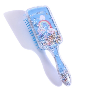 Cepillo rectangular para el pelo con dibujo azul y lado liso