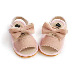Sandalia infantil rosa con lazo